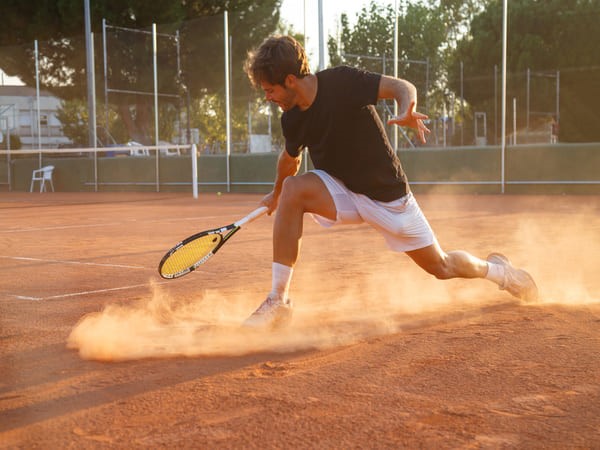 Sân tennis mặt đất nện